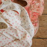 Elodie petit river rose baby bib