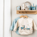Done By Deer sleeved pocket bib tiny farm, sand